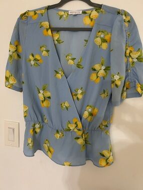 Socialite Light Blue Lemon-Print Wrap Peplum Blouse